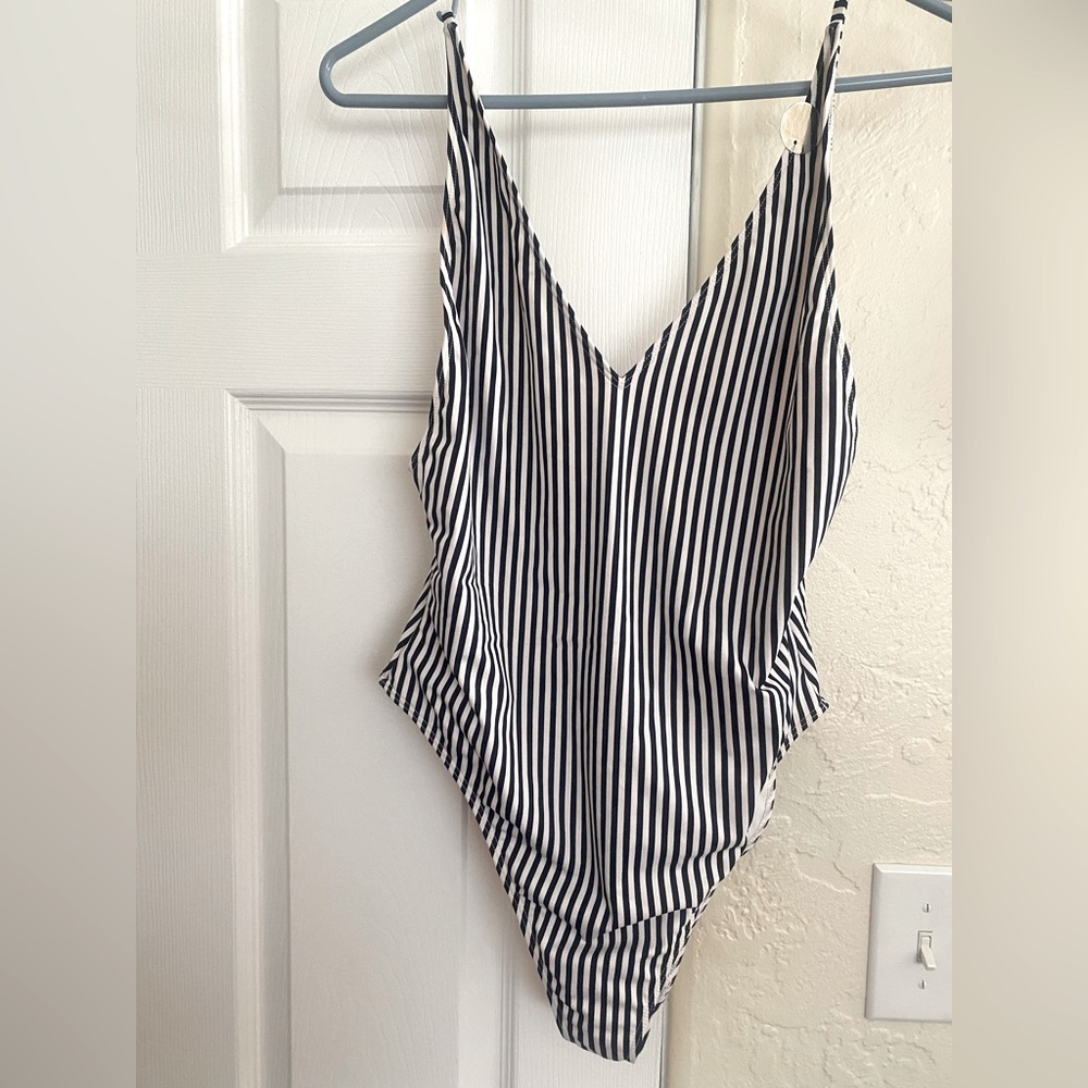 Black and white striped one piece bathing suit